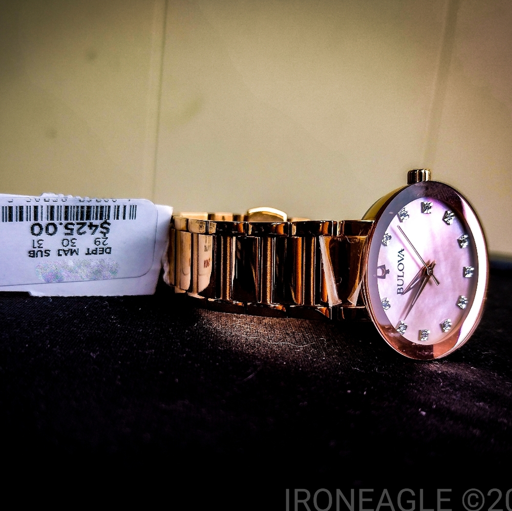 Bulova Rose Gold Watch with Diamond accents and Mother of Pearl Dial!